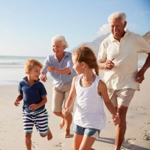 hard of hearing couple on a windy beach 