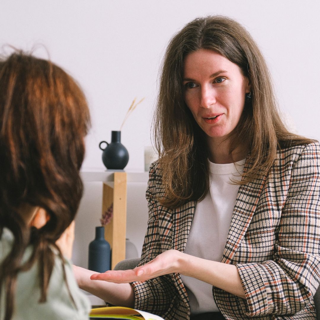 A woman talking to someone