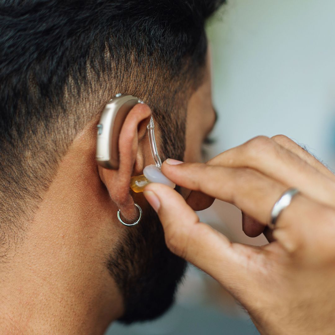 A person wearing a hearing aid