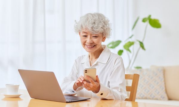 older woman using auditory training