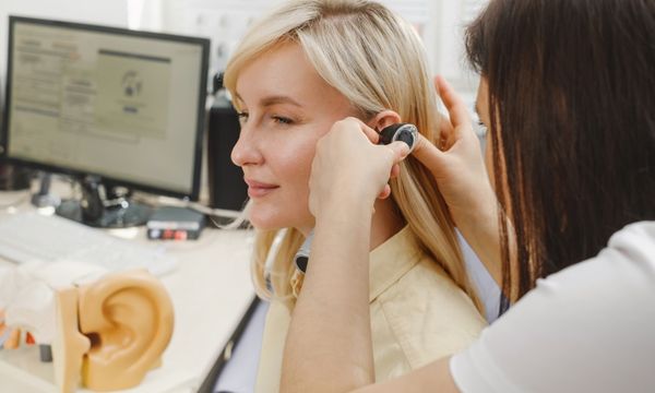 woman getting a hearing evaluation